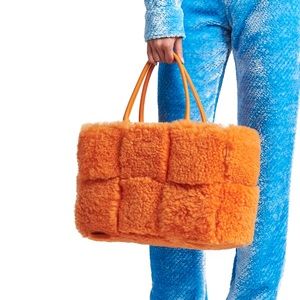 Brand New Bottega Veneta
Arco Woven Shearling East-West Tote Bag